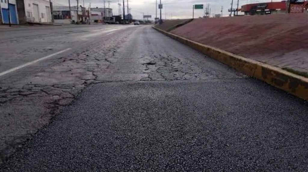 Calzada reparada con asfalto nuevo, Av. Los Carrera